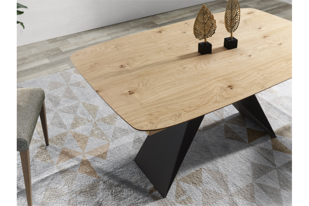 Detalle mesa de comedor extensible y pata central metálica con diseño moderno modelo Yakka de Indesan