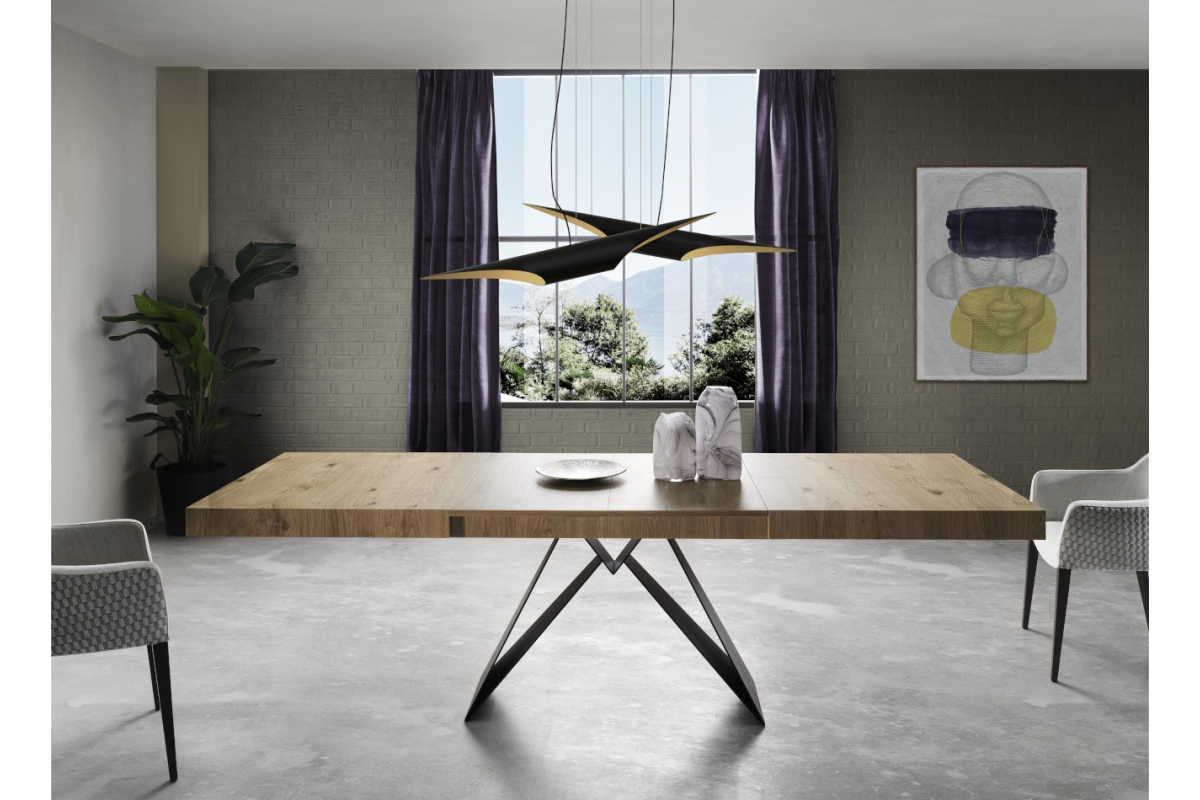 Detalle mesa de comedor extensible tapa porcelánico y pata central metálica con diseño moderno modelo Stato de Indesan