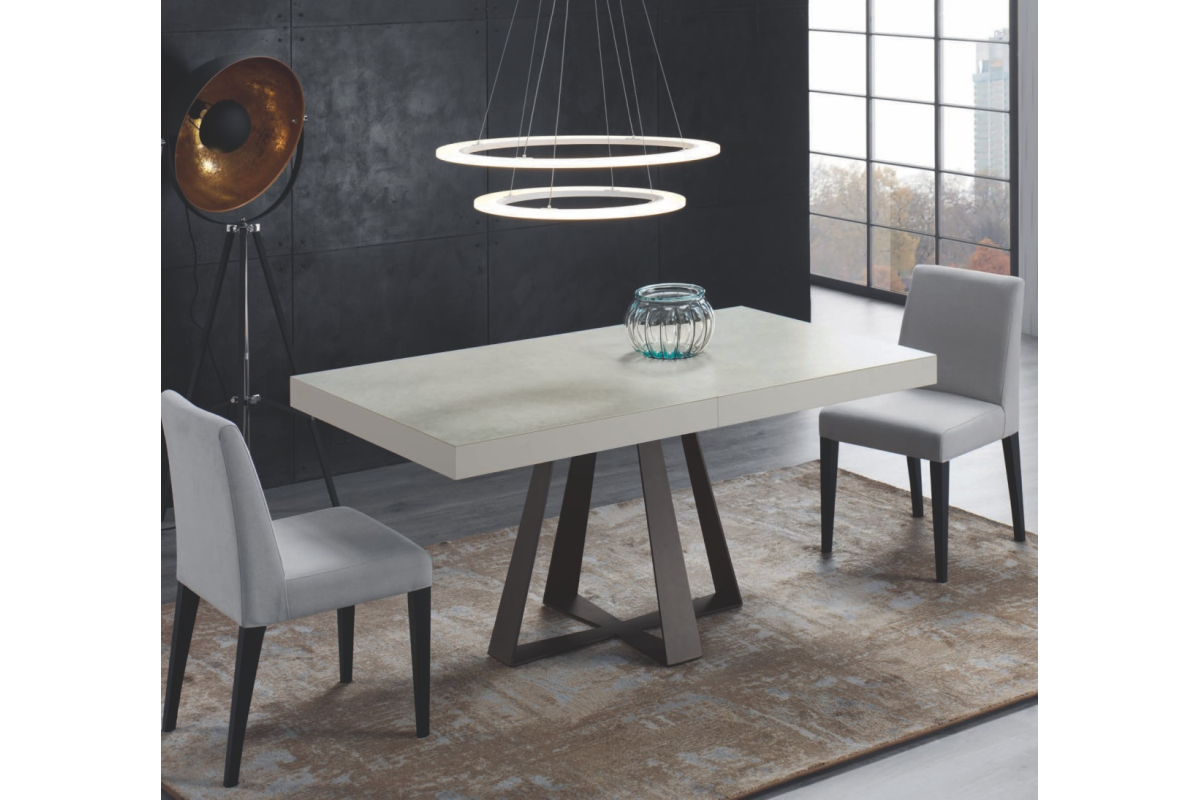 Mesa de comedor extensible tapa porcelánico y pata central metálica con diseño moderno modelo Cross de Indesan