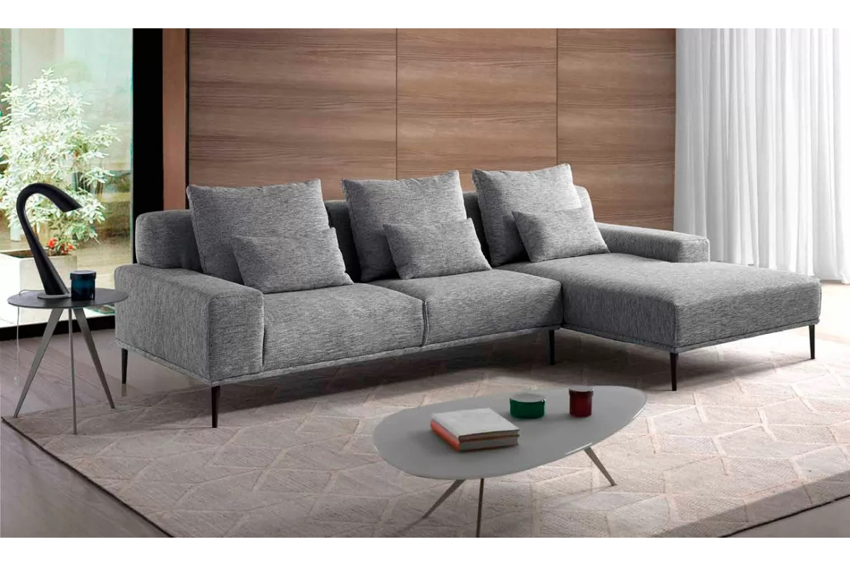 Sofá chaiselongue con asientos fijos modelo Dove diseño minimalista de Afos Sofás