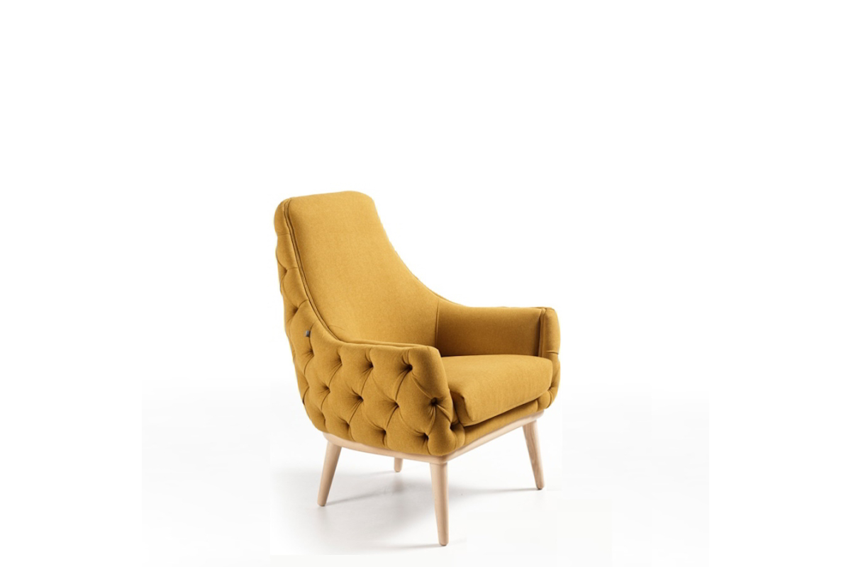 Sillón butaca con diseño moderno modelo Moli Capitoné de Reyes Ordoñez