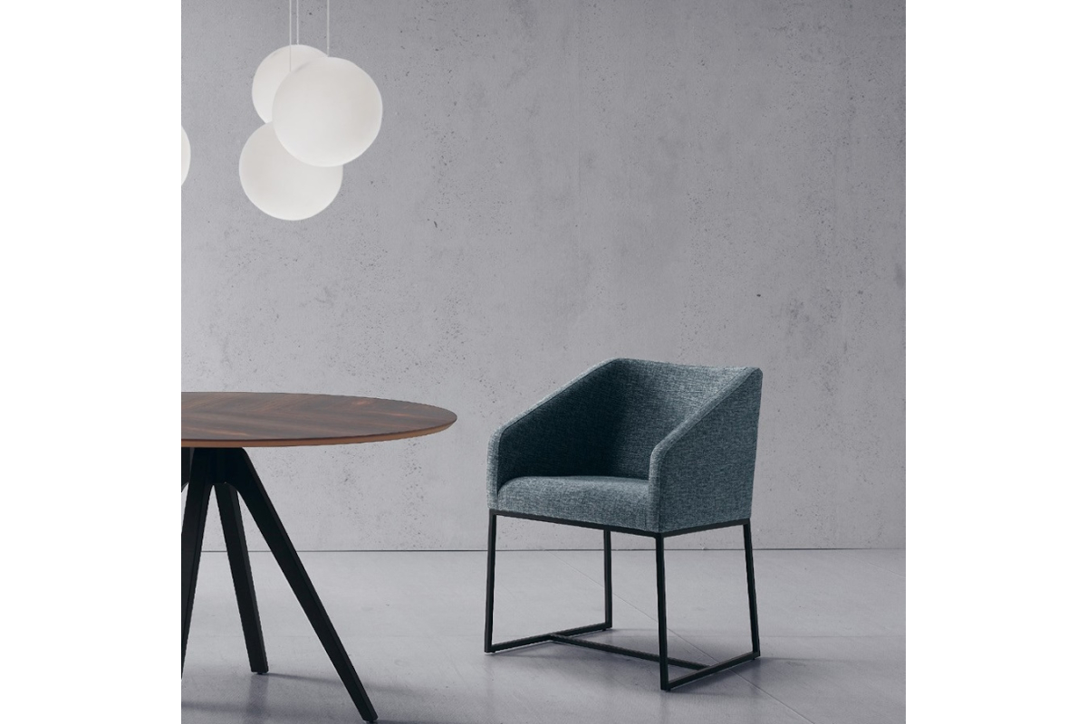 Sillón de comedor con diseño moderno modelo Nuez de Modesto Navarro